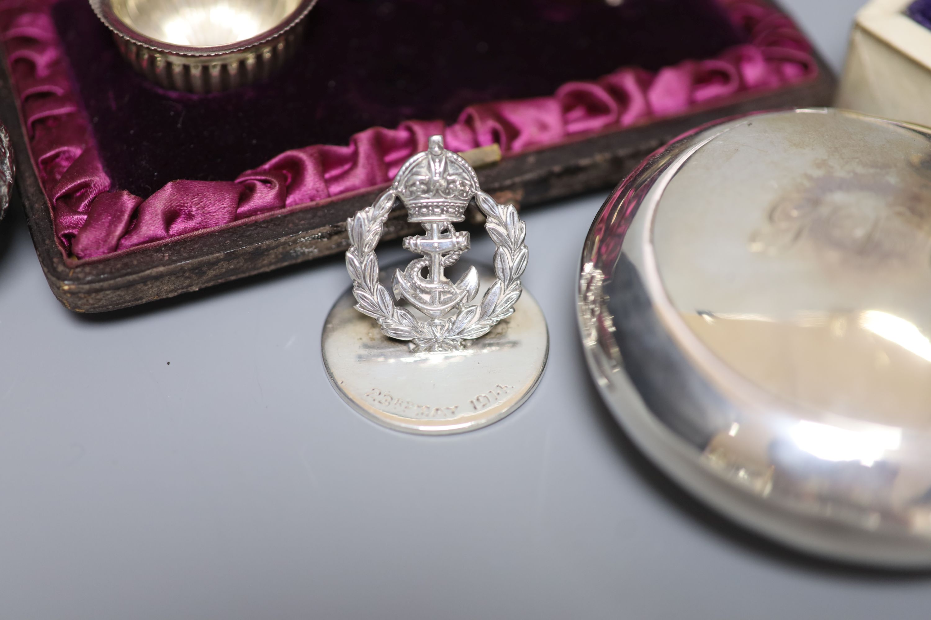 A group of small silverware, including Edwardian tobacco box, London, 1902, a cased pair of salts and a menu holder and other white metal items including Indian.
